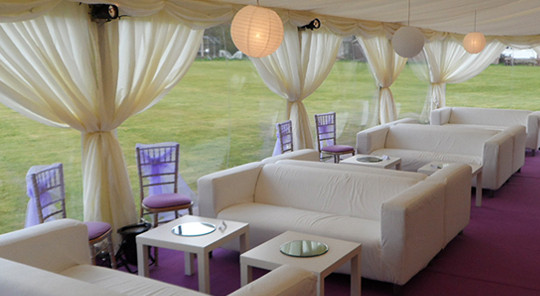 Marquee lounge with sofas