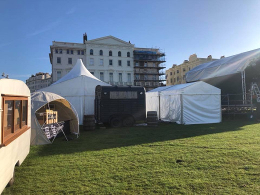 Marquees and trailer on Hove Lawns