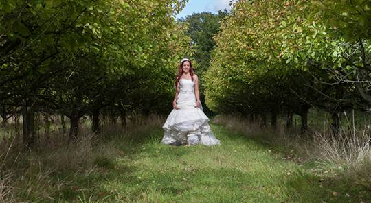 Bride outside at countryside venue